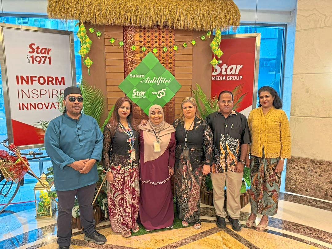 Ku Siti Aishah (third from left) with her colleagues from SMG’s administration department. Photo: Ku Siti Aishah Ku Mokhtar