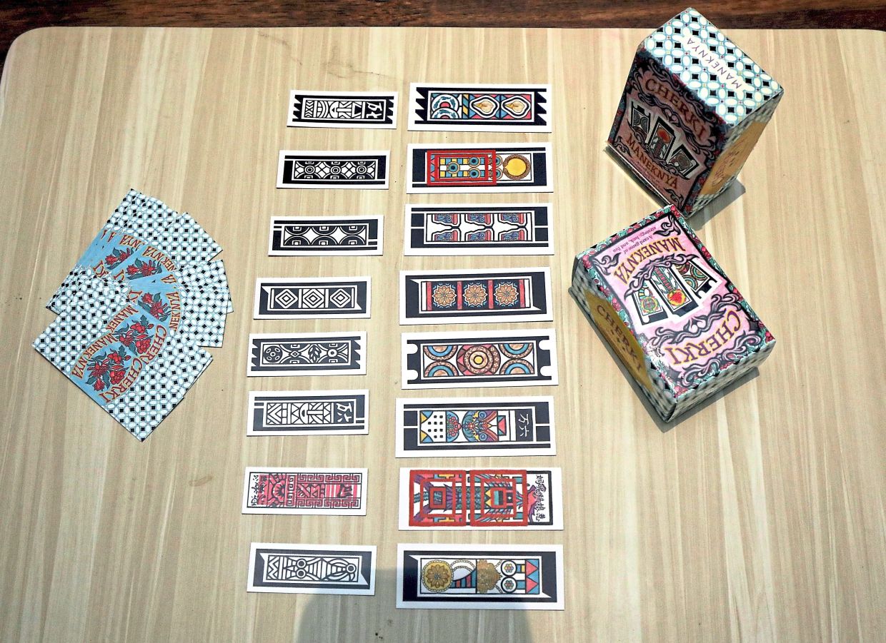 The newly designed cards (right) give the heritage game a fresh and modern appeal while preserving the old version’s (left) charm.