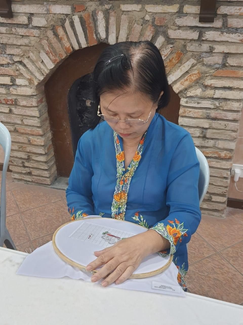 Tan Kim Lian, Swee Lin’s mother, continues the Peranakan beading tradition by handcrafting intricate pieces. Photo: Lee Swee Lin 