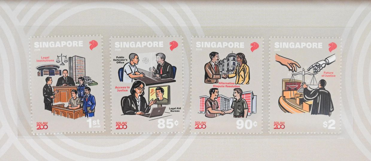 The special commemorative four-stamp set designed by Andy Koh. - Photo: ST