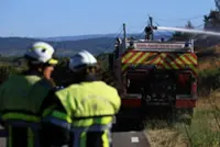 Firefighters battle wildfire in southern France