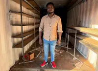 Scared but staying: Some migrants dig in as South Africa turns hostile