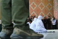 Indonesia’s Aceh flogs couple for kissing in TikTok video