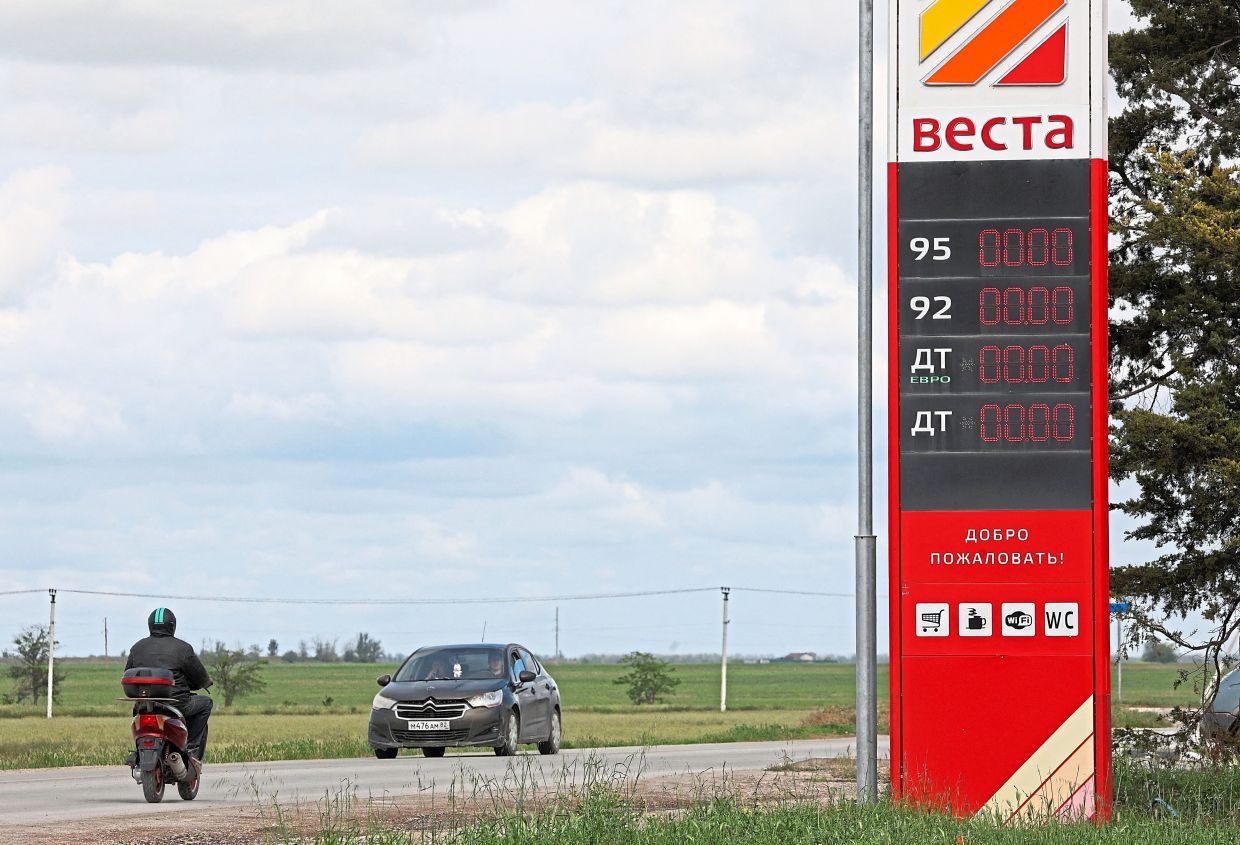 A fuel price board displaying zeros at a gas station after the authorities restricted fuel sales in Yevpatoriya. — Reuters