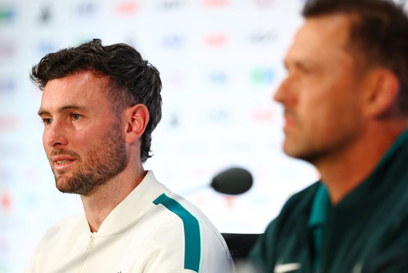 Soccer-Impatient Popovic confident Australia can make history against Egypt