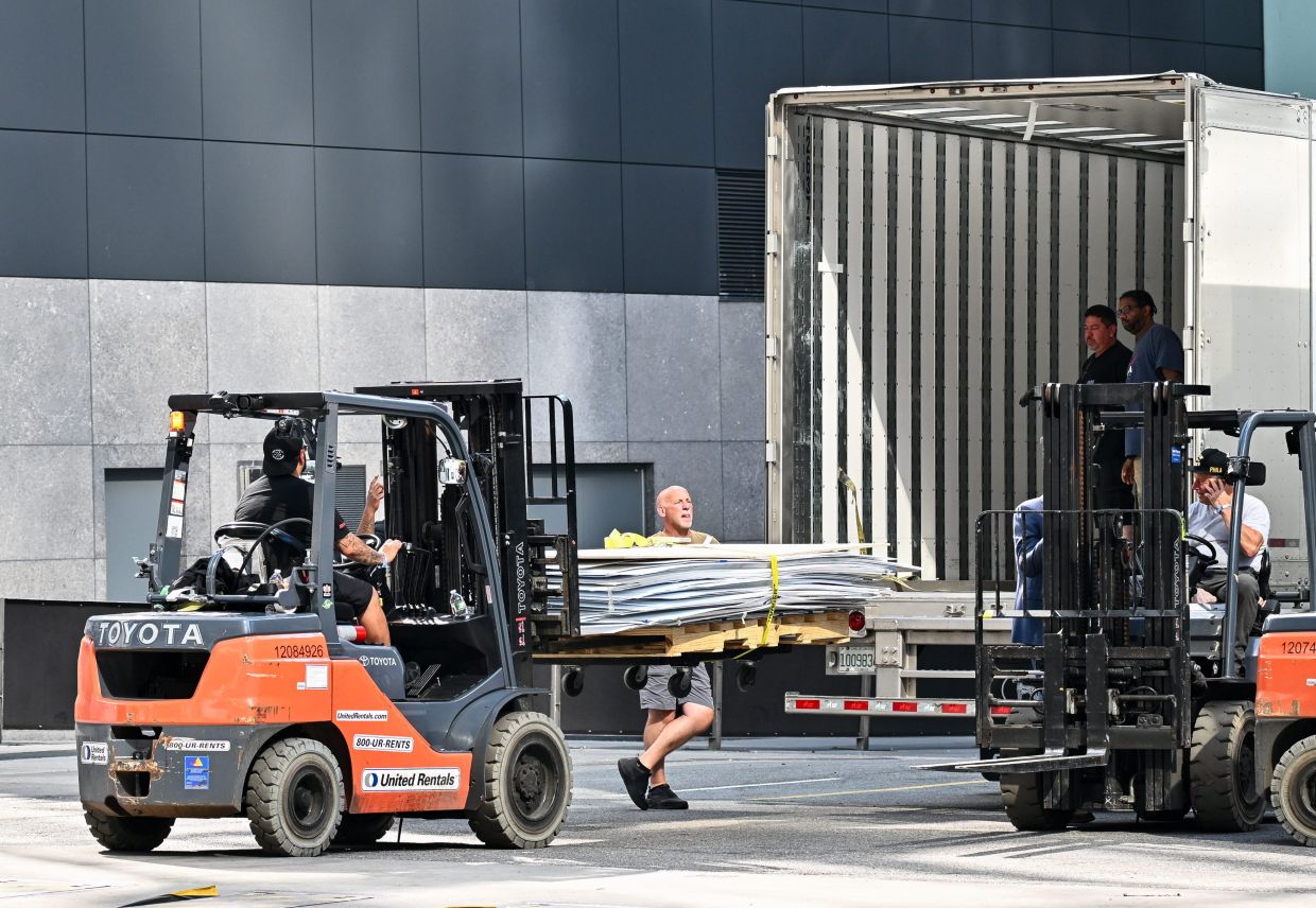 Workers unload material outside Madison Square Garden ahead of a reported wedding between singer Taylor Swift and National Football League player Travis Kelce on on Thursday, July 2, 2026, in New York. Photo: AP