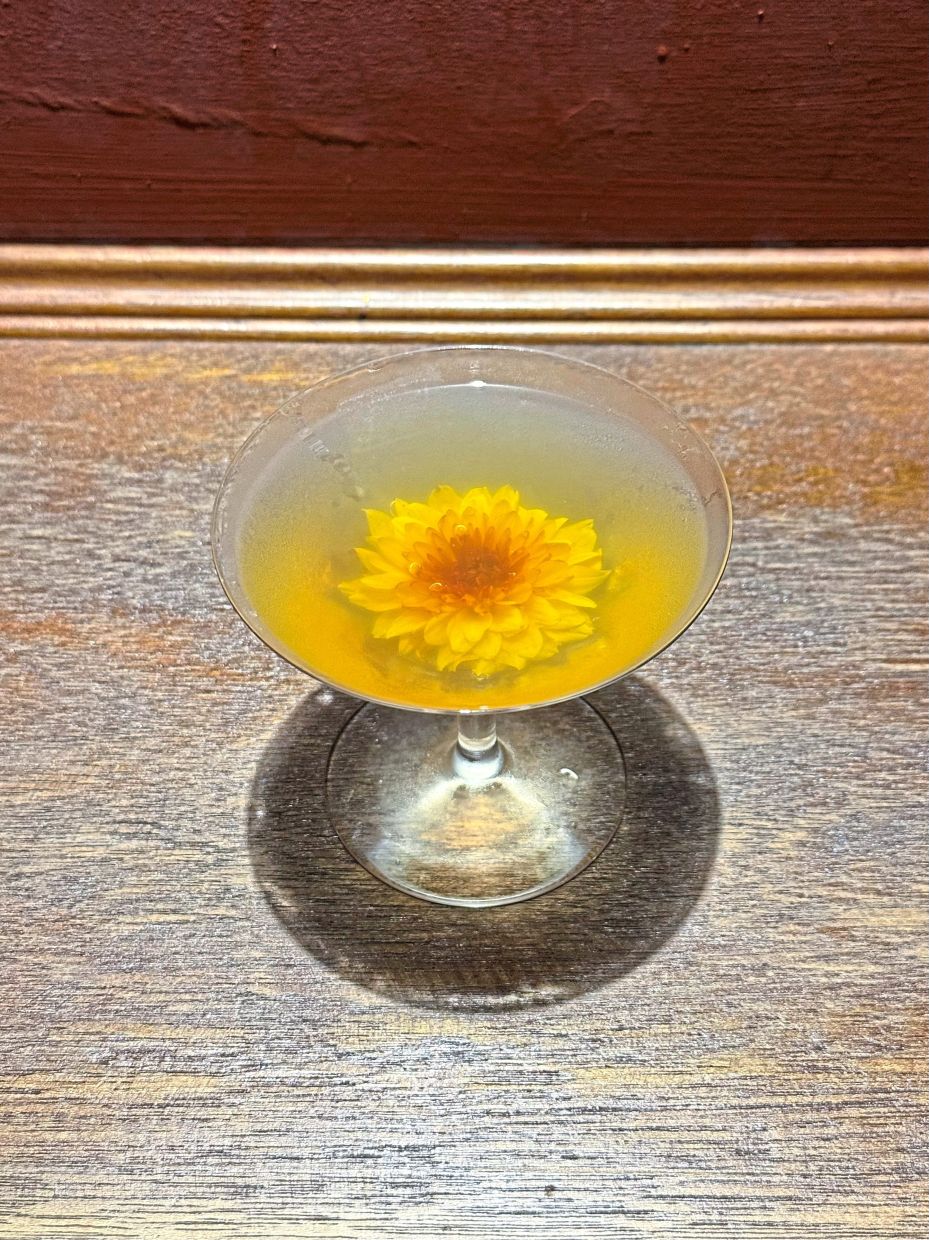 Backdoor Bodega's Reunion Martini comes with an entire flower in it.