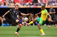 Soccer-Canada’s De Fougerolles learning fast on World Cup stage