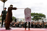 Indonesia's Aceh canes couple for kissing in TikTok video
