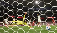 Soccer-Slick Switzerland sweep past Algeria into World Cup last 16
