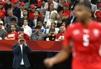 Soccer-Swiss steel sees off Algeria World Cup challenge, says Yakin