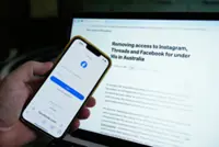 Australian prime minister condemns delay of changes to child social media ban