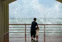 Tropical Storm Maysak hits southern China's Hainan, flights and ferries suspended as thousands expected to be affected