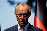 In riposte to Trump, Merz says Germany can defend its military spending push