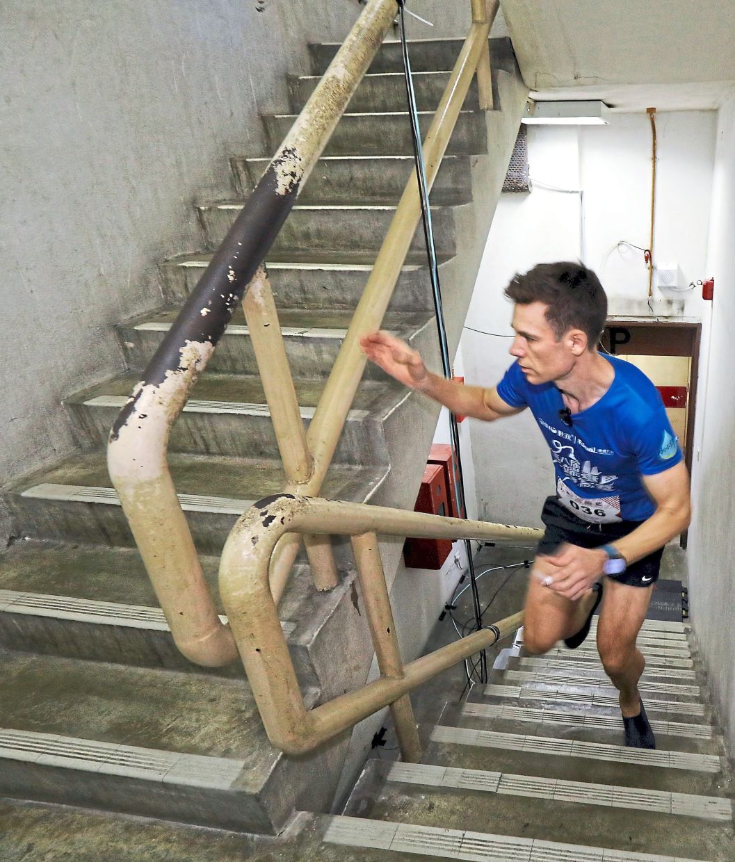 A participant making his way up the 552 steps of Menara MBPJ during the tower run.