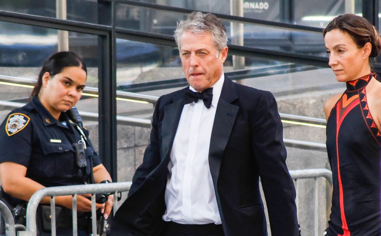 British actor Hugh Grant and Swedish producer Anna Elisabet Eberstein arrive at Madison Square Garden. Photo: Reuters