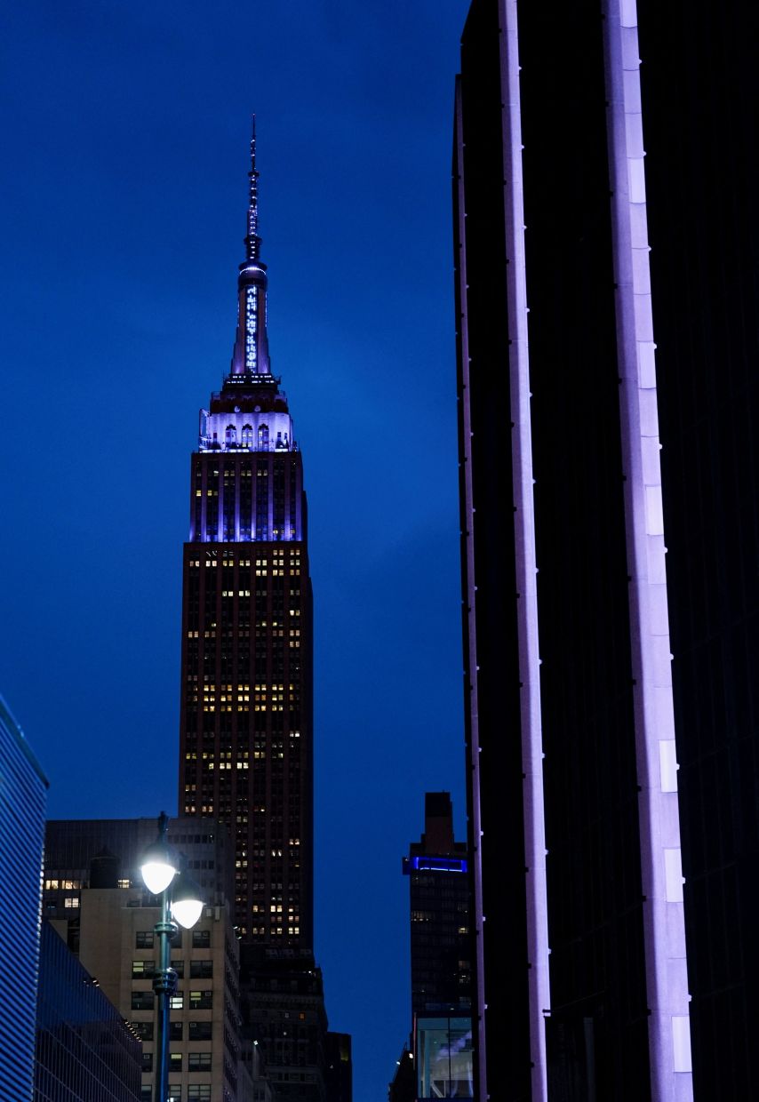 The Empire State Building is illuminated blue to mark the wedding of singer Taylor Swift and Travis Kelce. Photo: Reuters