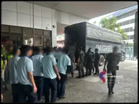 Immigration Dept detains 81 people during raids at two Larkin factories