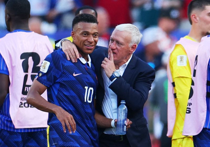Soccer-Deschamps feared Paraguay would ‘chop down’ Mbappe as France advance