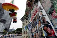 Soccer-Mexicans balance World Cup joy with worries over domestic issues
