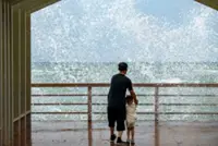 Heavy rains leave five dead in China's north while Tropical Storm Maysak hits the south and Vietnam