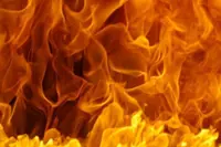 Fire erupts after suspected explosion at community oil well in Indonesia's Aceh Province