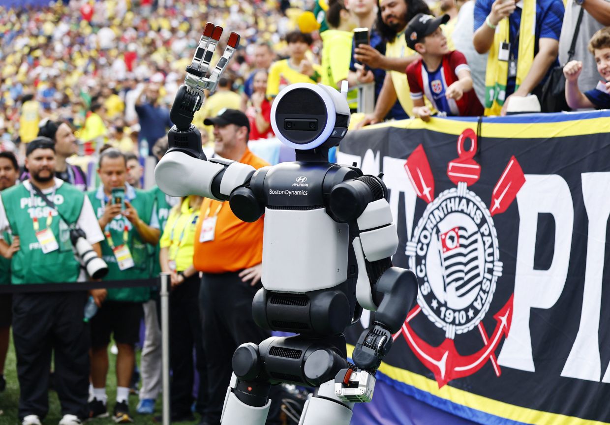 Hyundai Motor showcases humanoid at World Cup in robotics push