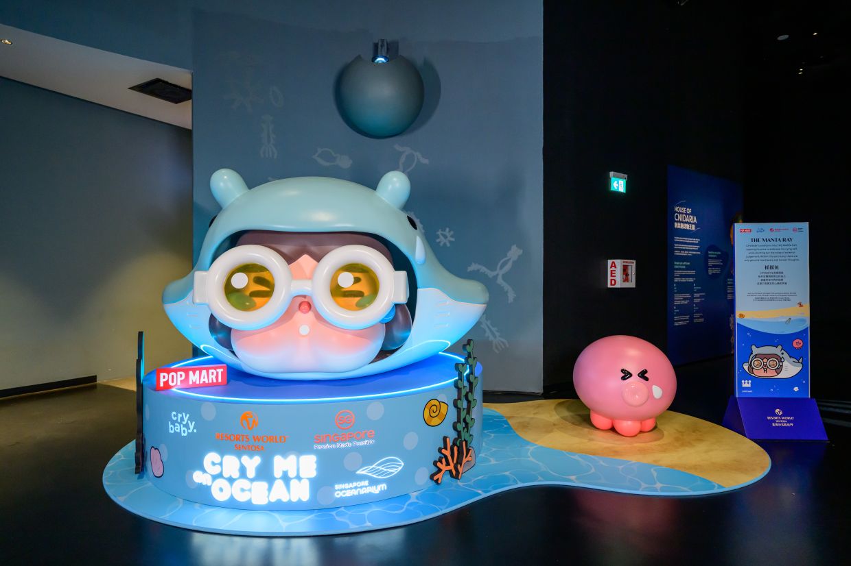 The Crybaby characters feature cute companions, like this manta ray and its octopus buddy.