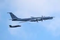 UK says aircraft carrier approached by Russian plane in Norwegian Sea