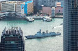 Residents, visitors flock to waterfront as PLA Navy ships sail into Hong Kong