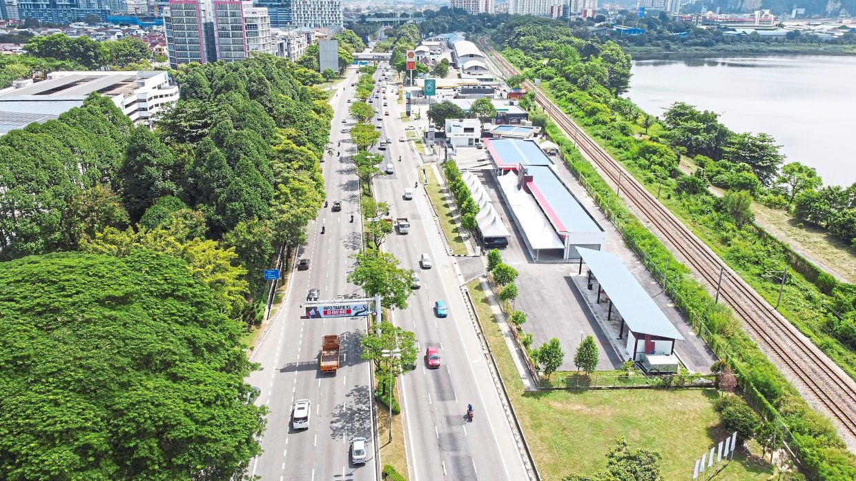 A car showroom (on the right) in Jalan Kuching, Kuala Lumpur is built on land gazetted as a green lung. — IZZRAFIQ ALIAS/The Star