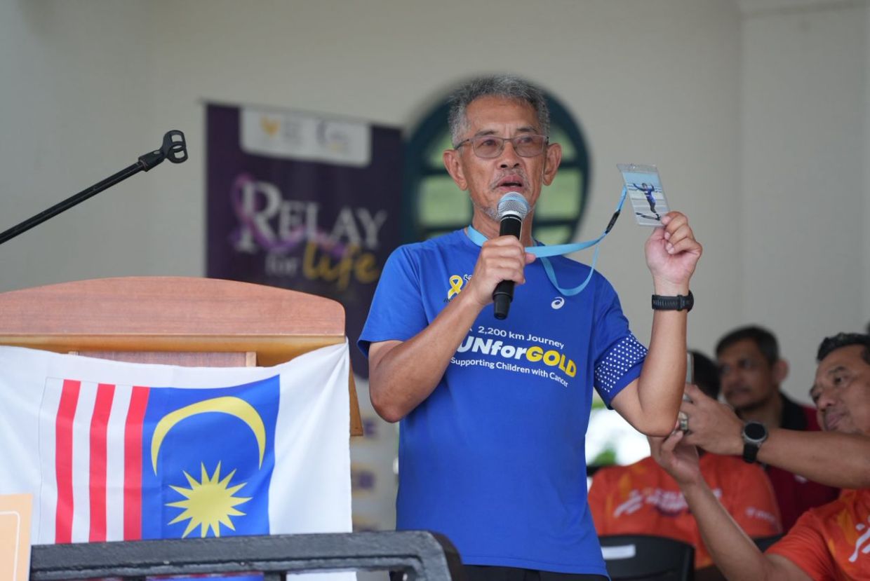 Dedicating the run to his late wife, Lim sees it as a way to fulfil their shared dream of travelling through the country on foot. Photo: National Cancer Society Malaysia