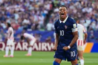 Soccer-Mbappe fires back at Paraguayan senator's racist attack after France victory