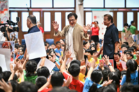‘Help others when you’re successful one day’: Action star Jackie Chan encourages pupils at Singapore school
