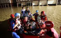 China reports 10 dead after rain and storms batter provinces