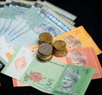 Ringgit ends higher on weaker greenback, firmer oil