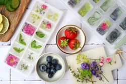 Ice that's nice: Turn ice cubes into drink ornaments with berries and herbs