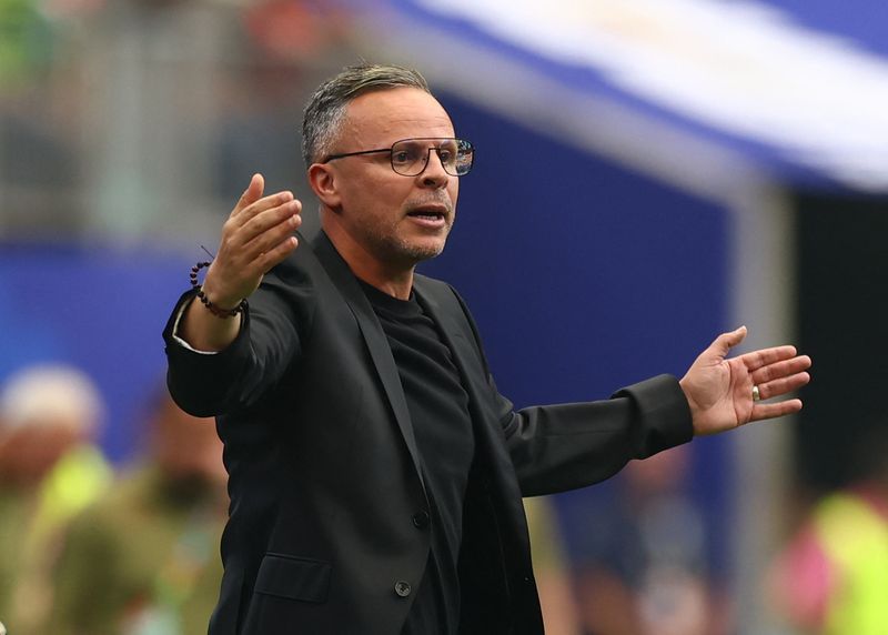 Soccer-Morocco coach Ouahabi not held back by inexperience at international level