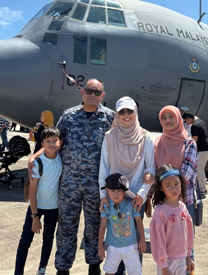 Nur Amalina (third from left) with her husband, Air Force Mejar Mohammad Nurshafiq Omar and their children - son Thariq Al Kharj (far left), daughter Annur Sofea (far right) and (front) Mohammad Talhah and Auliya Nuha - during a family outing.