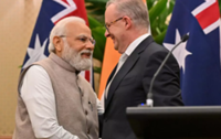 Modi visits Australia for minerals talks and rockstar welcome