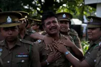 Families mourn 26 killed in deadly Sri Lanka prison riot
