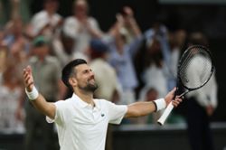 Tennis-'Racket and heart' as Djokovic tames Auger-Aliassime to return to Wimbledon semis