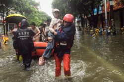 Rescuers search for missing in China storms after 100,000 evacuated