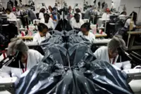 Venezuelan fashion workshop swaps gowns for body bags after deadly earthquakes