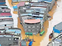Floods hit as super typhoon looms