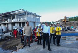 Public Works minister in hot water as family listed in official trip