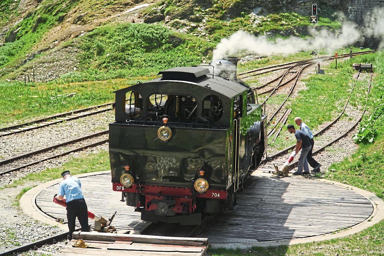 A steam locomotive is turned on a turntable at the Furka station near Realp in Switzerland.