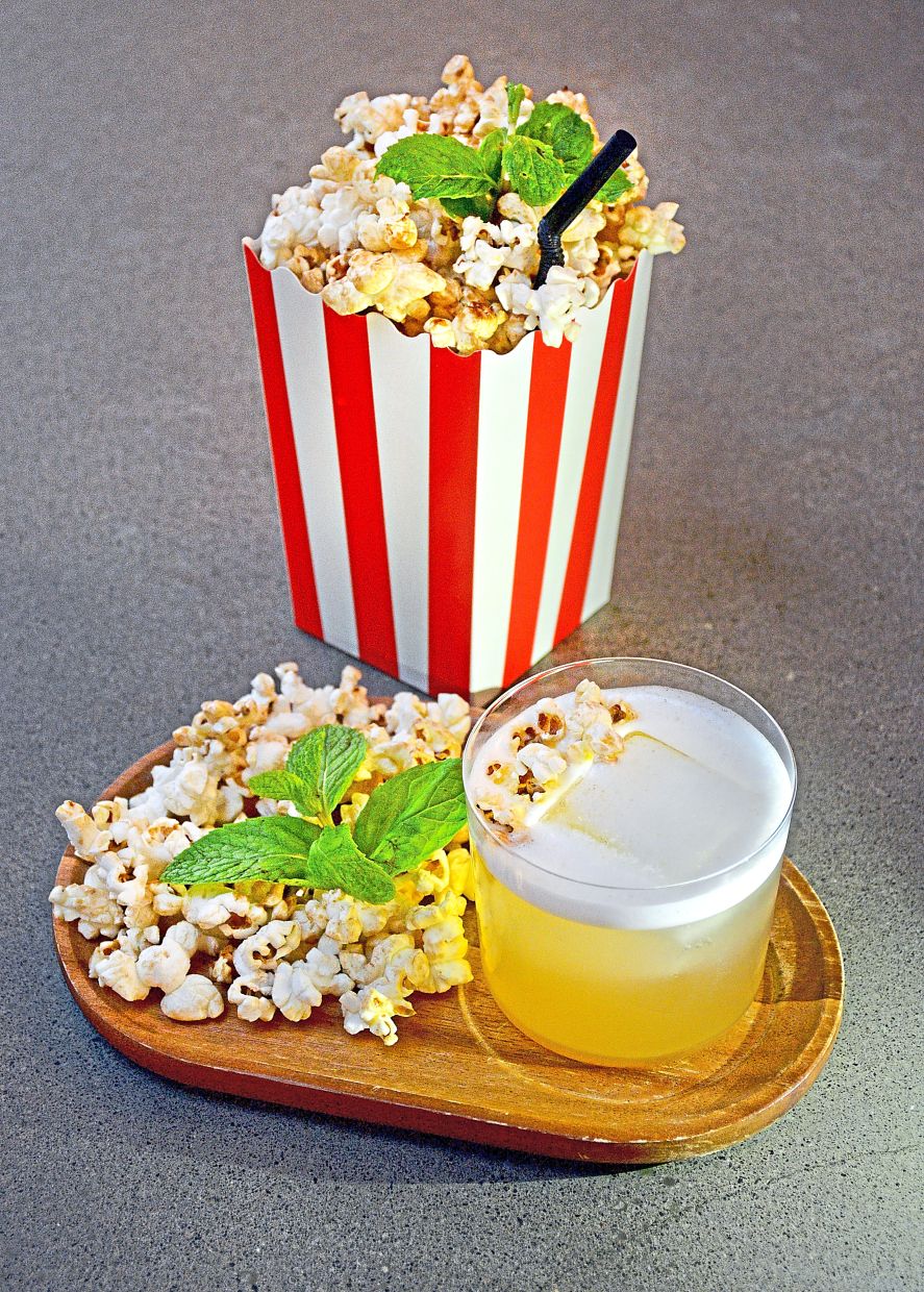 Enjoy the Popcorn Sour on a tray or in a theatre-style popcorn box.
