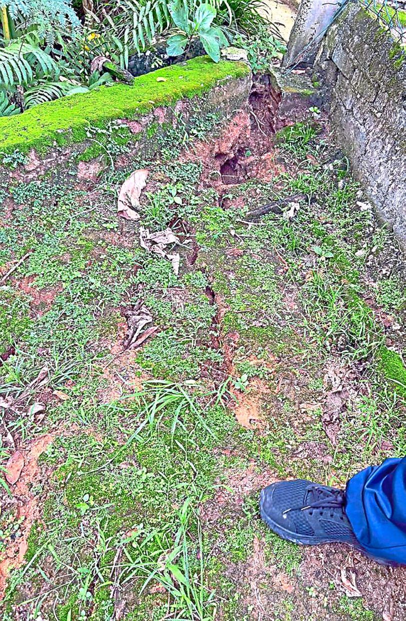 Zulkifli believes that frequent blasting has led to land subsidence around his house.