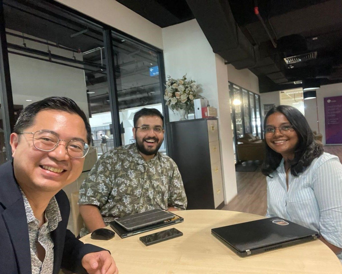From left: Lim together with Cup.A.Cino student founders Amaresh and Shireesha.